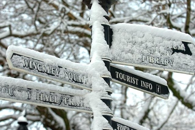 A chilly looking signpost near Winckley Square