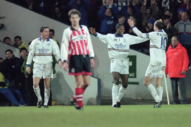 Phil Masinga celebrates scoring his first goal in the 105th minute. He swept home after an exchange between himself and Gary Speed.