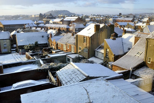 Snowy rooftops in the old town, 100781e.