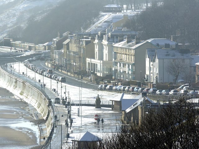 Snow in Filey, looking down on the seafront, 100785b