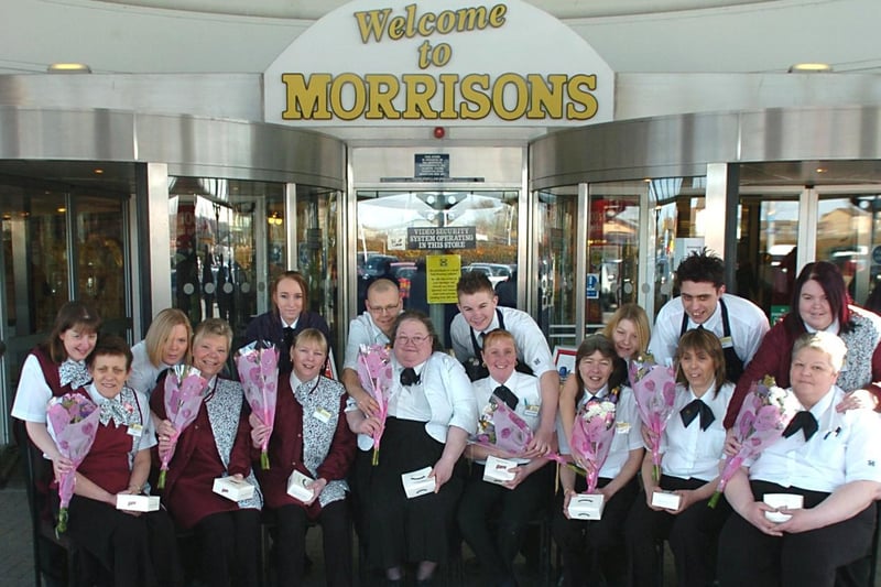 March 2006 and sons and daughters who work with their mothers at Morrisons in Hunslet presented them with chocolates and flowers for Mother's Day.