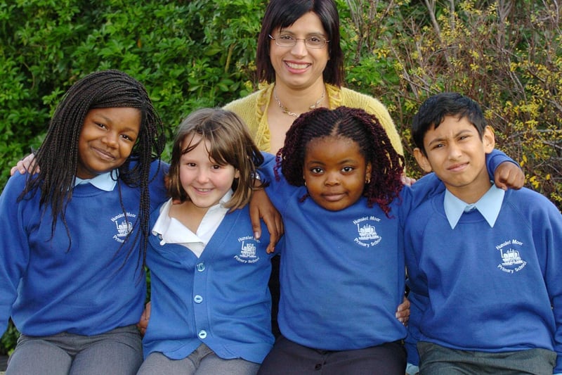 December 2006 and Hunslet Moor Primary headteacher Narinder Gill is pictured with pupils wearing their new sweaters. From left, Melissa Sibanda, Toni Sanderson, Megan Molengo and Nasim Abdul.