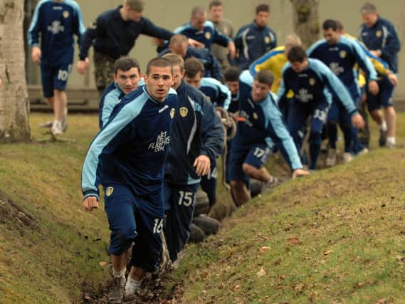 Enjoy these photo memories from the day the Leeds United squad took on an army assault course. PIC: Gerard Binks
