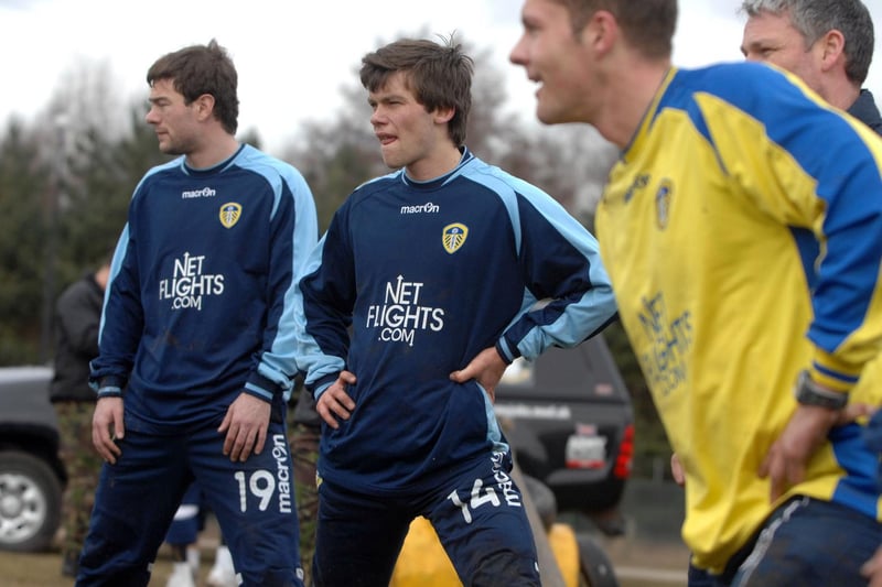 Jonny Howson and Ben Parker do stretches after the assault course.