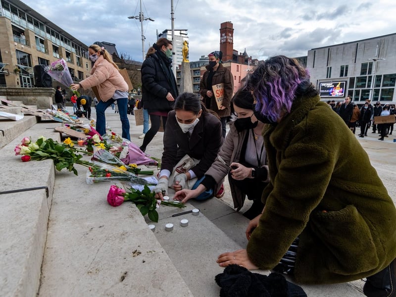 The vigil and protest concluded with handheld fountain flares omitting green and purple smoke into the air as people rose from the ground cheering and chanting as they began to leave.