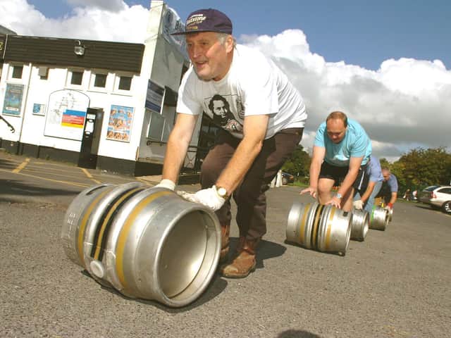 Preparations for Lytham Beer Festival at Lowther Pavillion, 2009. Ray Jackson and CAMRA colleagues roll out the barrells.