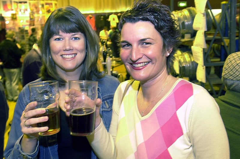 Lynne Hornby and Annabel Earnshaw tuck into their pints at Fleetwood Beer Festival in 2004
