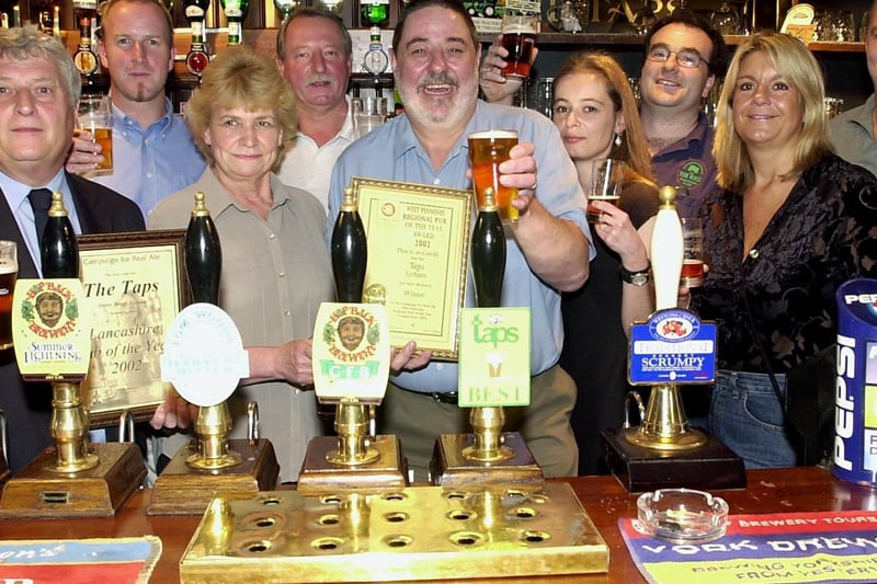 CAMRA named The Taps pub in Lytham both Regional and Lancashire Pub of the Year in 2002. Landlord Ian Rigg (centre). CAMRA Regional Organiser Ray Jackson(left), and brewers from across Lancashire who joined in the celebrations.
