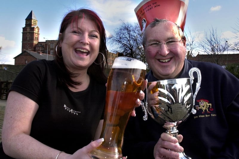 The 17th Wigan Beer Festival is launched by CAMRA members Debbie Collier and Brian Gleave with this year's theme being champion ales in 2004.