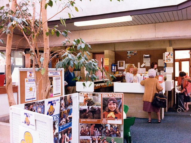 Horsforth Branch Library on Town Street in June 1985.. The adult lending section is located in the extension to the building opened in 1975. A display celebrating the 75th anniversary of the Girl Guide Association is seen in the foreground.