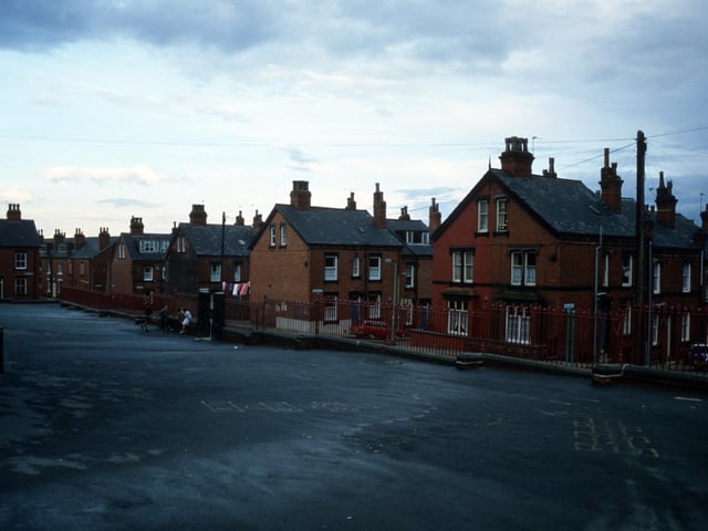 A view from the playground of Quarry Mount Primary School in August 1985 looking towards Cross Quarry Street. Streets of terraced housing leading off are (from right) Bolland Street, Thomas Street, Quarry Place, Quarry Street and Christopher Road.