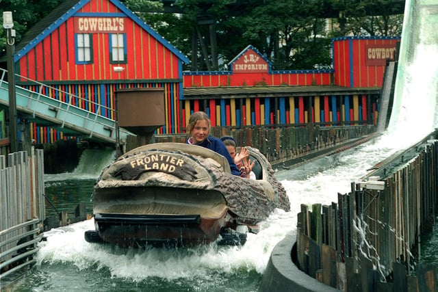 This image of the log flume, from 1998, shows the wild west theme that ran throughout the park in the background