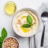 Hummus made with chickpeas is a cholesterol lowering food. Photo: Adobe