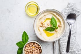 Hummus made with chickpeas is a cholesterol lowering food. Photo: Adobe