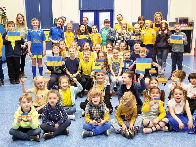 All the children at Holmeswood Methodist School wore blue and yellow to stand with Ukraine and the appeal