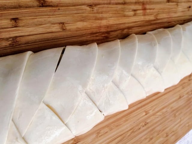 Brush the finished plait all over with beaten egg and bake at 200 degrees until puffed up and golden.