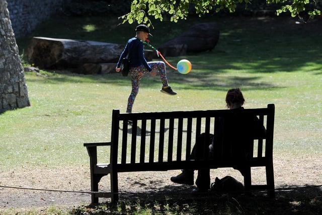 People enjoy the hot weather in Museum Gardens York, as the heatwave continues