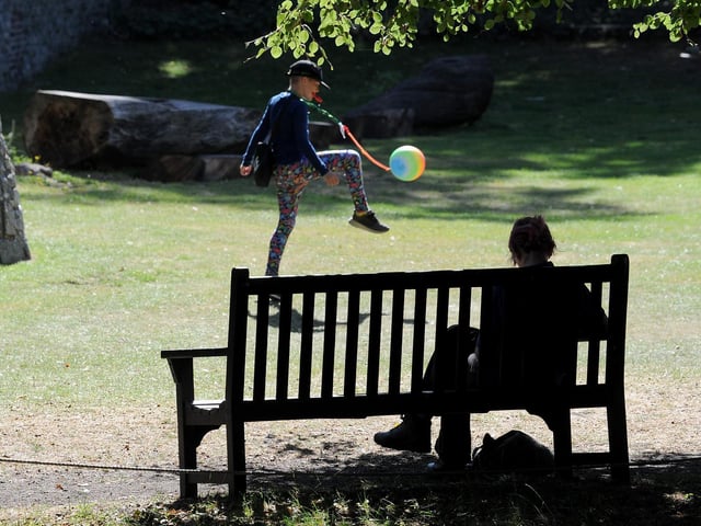 People enjoy the hot weather in Museum Gardens York, as the heatwave continues