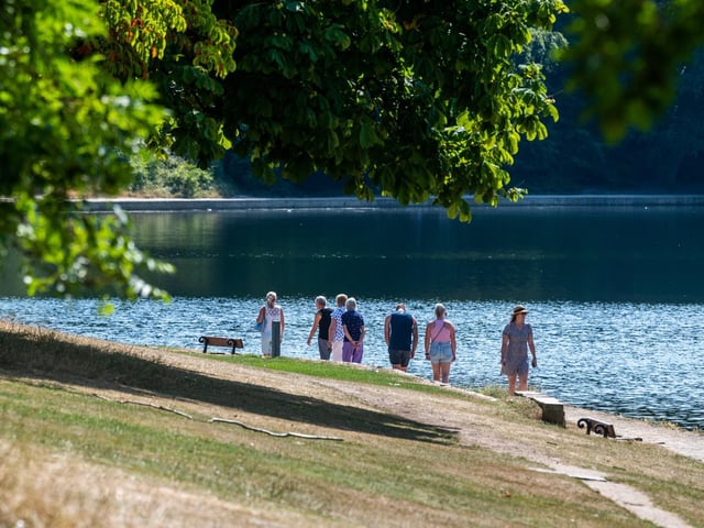Members of the public out enjoying the warm weather in Roundhay Park, Leeds