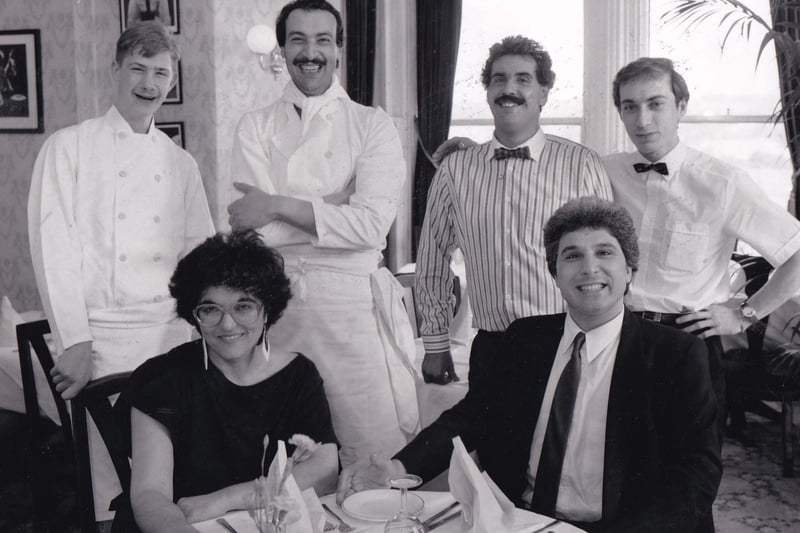 Owners Vasoulla and George Psarias (seated) at the Olive Tree restaurant in Rodley in September 1988. They are pictured with staff Paul Auty, Andrea Iacovou, Federico Orlandine and Pauolo Genco.