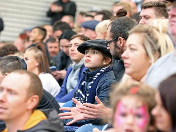 Flat-capped tributes to Trevor Hemmings at Deepdale on Saturday