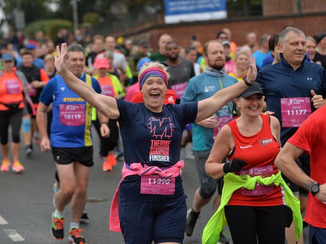 Runners pass through the city