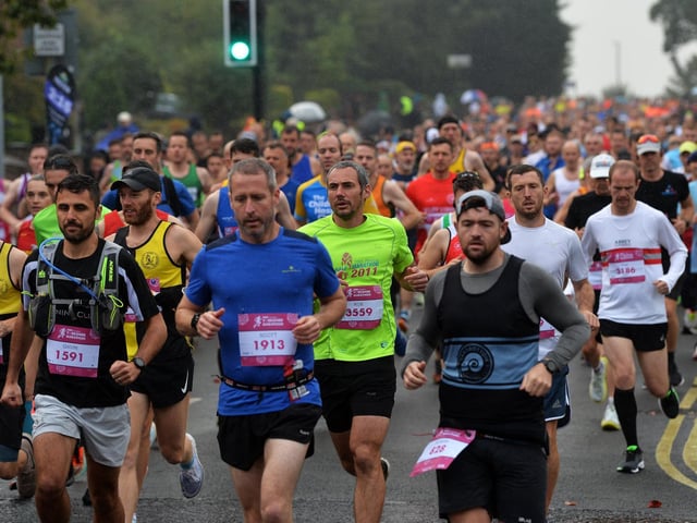 Crowds lined the route on a dreary autumn day