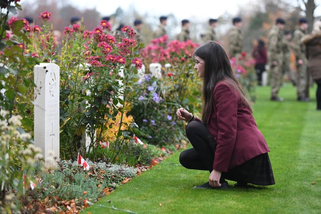 14th November 2021
Service of Remembrance at the Commonwealth War Graves Cemetery, Harrogate.
Pictured Charlotte Banach from Ashville College lays a red carnation at one of the war graves
Picture Gerard Binks