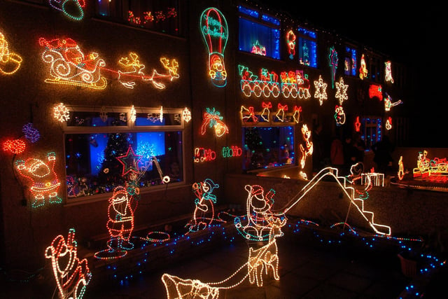 Houses on Pennystone Road in Halton lit up for Christmas in 2009.