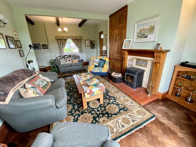 The home has three reception rooms.