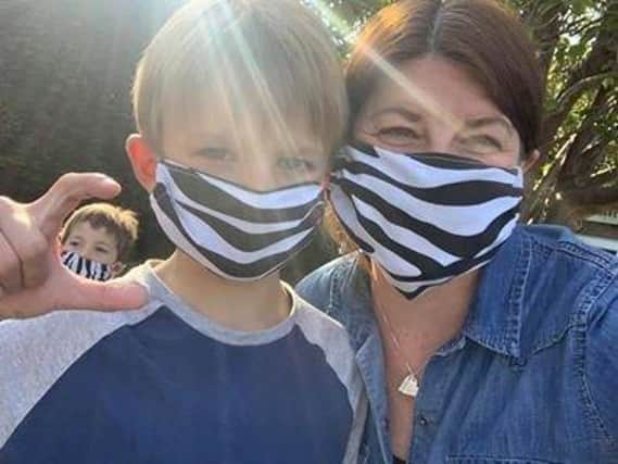 Libby Kearsley shared this snap of herself and kids in zebra print masks