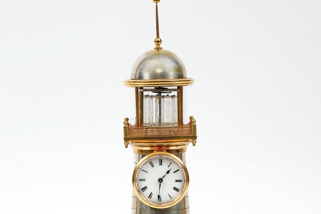 A rare circa 1895 automaton mantel timepiece of lighthouse form by AR Guilmet, at £7,950 from Richard Price.