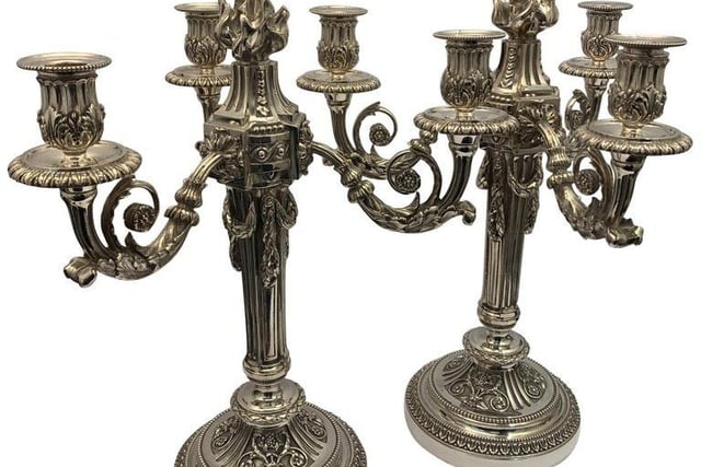 A pair of very heavy silver plated circa 1850 bronze candelabra, decorated with flowers, leaves and vines at £5,200 from Stephen Kalms Antiques.