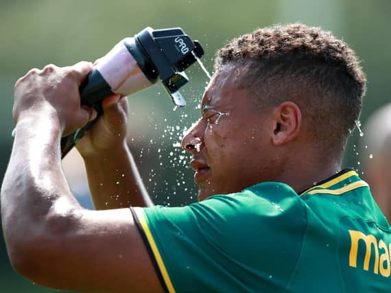 Reuben Bird-Tulloch cooling down during a hot week at Saints training