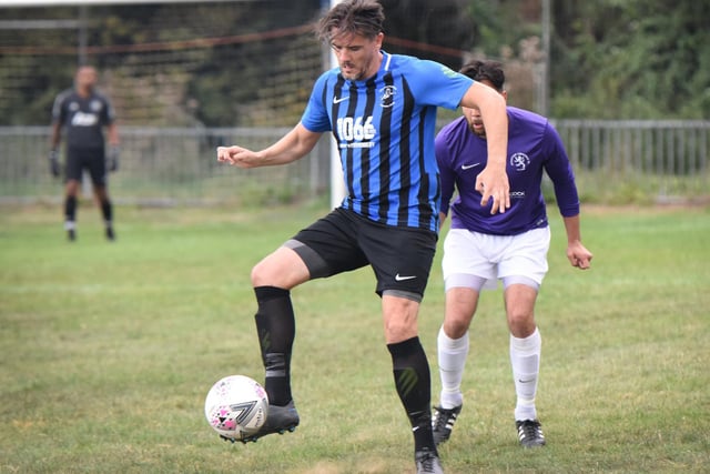 Dommy Clarke on the ball for Hollington United
