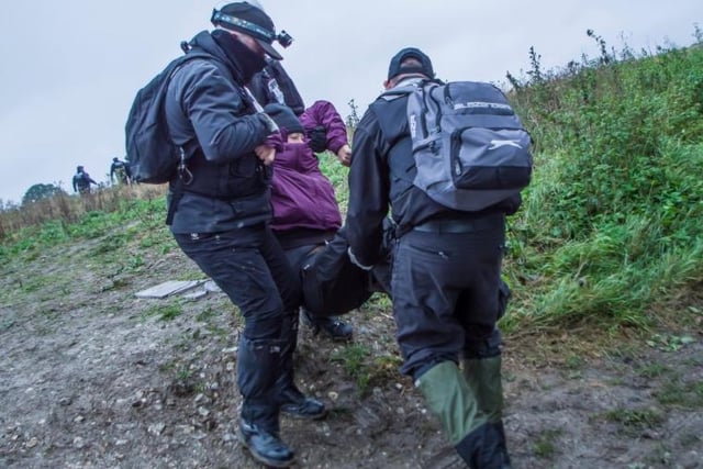 A protester is carried from the site by HS2 workers and police, protesters have said the approach felt heavy handed