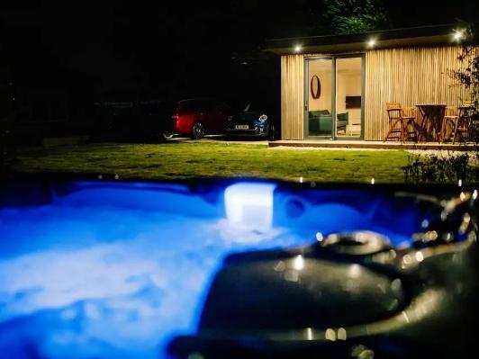 It has a heated five person hot tub perfect for sitting outside and watching the stars.