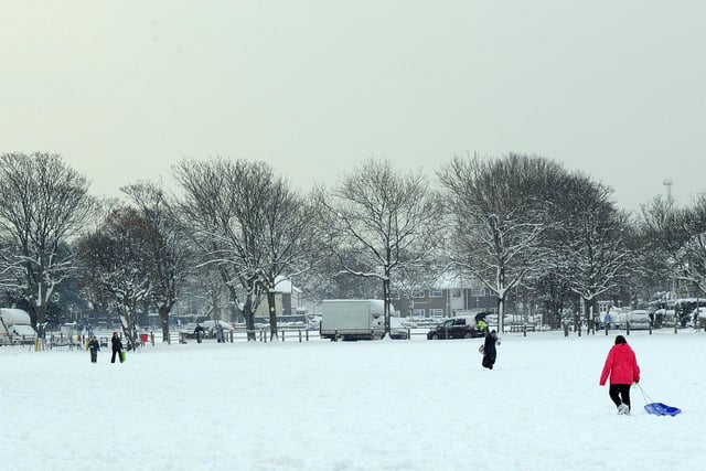 People enjoying the snow in Buckingham Park, Shoreham