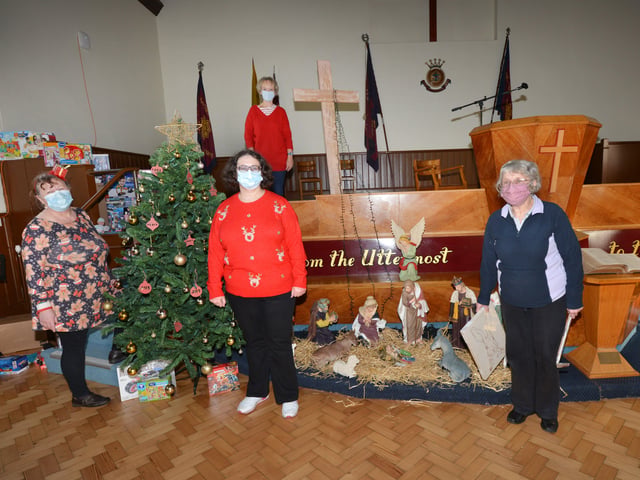 Surviving Christmas volunteers in Hastings making Christmas hampers . SUS-201214-125531001