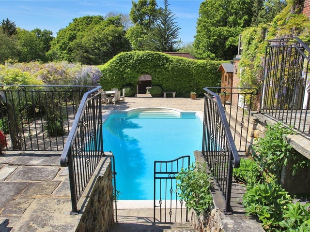 Built in 1924 by architect William H Bidlake, a leading figure in the Arts and Crafts movement, Loth Lorien is a distinctive family home listed in Pevsner’s Buildings of England. Price: £2,850,000.