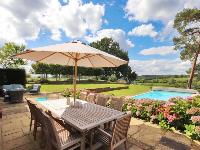 An elegant and beautifully presented country house surrounded by 113 acres of gardens, pasture and woodland. Price: £4,500,000.