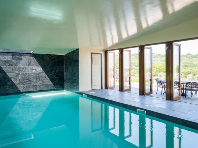 This exceptional house, designed by London based practice Alma-nac, sits in an elevated position. Price: £2,100,000.