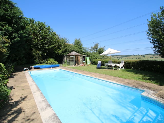 Beautiful detached Grade II listed farmhouse with private 100 yards of river frontage with mooring/fishing rights. Price: £1,400,000.
