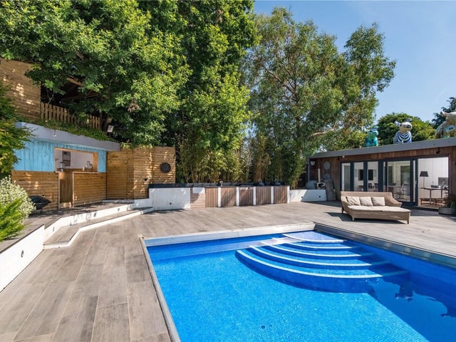 Superbly stylish four-bedroom family home, spread over three floors of versatile living space, looking out over the city to the sea. Price: £2,000,000.