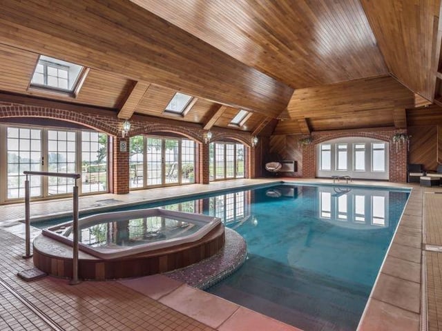 14-acre country estate dating back to the 14th century with three separate homes in an elevated position within the Ashdown Forest with spectacular far-reaching views. Price: £3,200,000.