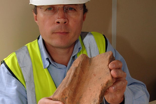 Phil Emery with some of the Roman pottery found in September 2008. Picture: Stephen Goodger W39009H8