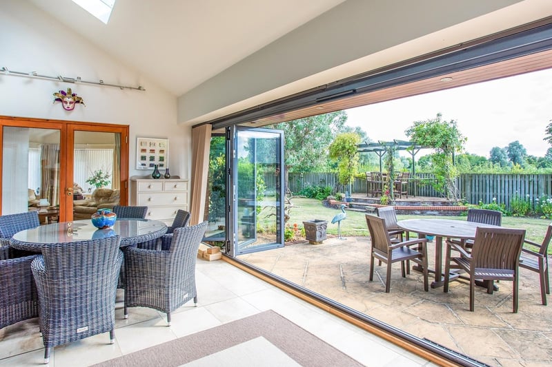 The garden room has double glazed windows to rear aspect. Bi-folding patio doors leading to rear garden. Velux windows to rear aspect. wall mounted radiator. It also shows off the spectacular private garden.