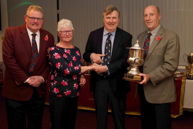 The Duke of Norfolk presents a Littlehampton Golf Club prize to Sheena and David Drake, watched by Kit Magrath