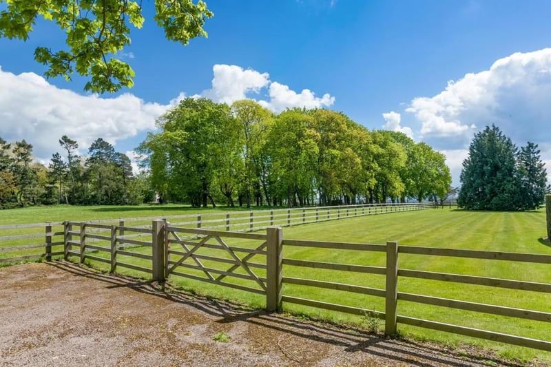 The property is set in 8.6 acres of grounds and gardens. Photo by Fine and Country