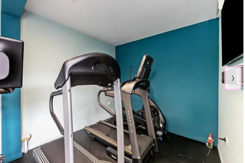 These creative owners have also converted another spare room into a home gym, full of useful equipment.
